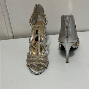 CAPARROS Elegant Silver Strappy Heels. Worn once